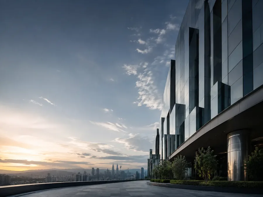 Modern glass office tower at dusk